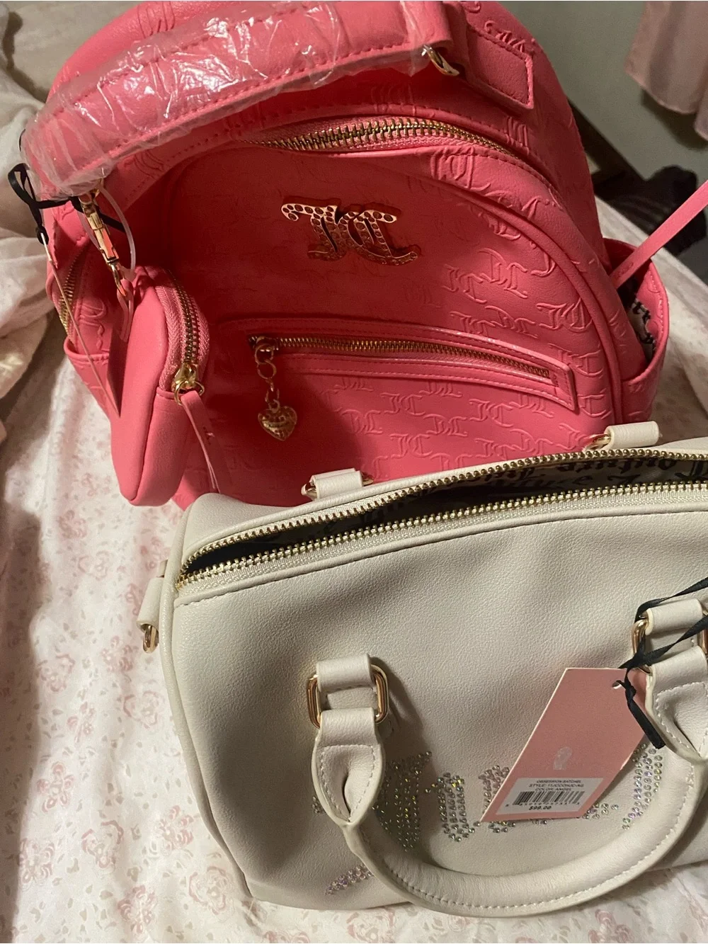 Pink Embossed Juicy Logo Backpack and Juicy Beige handle bag.  This is for BOTH.